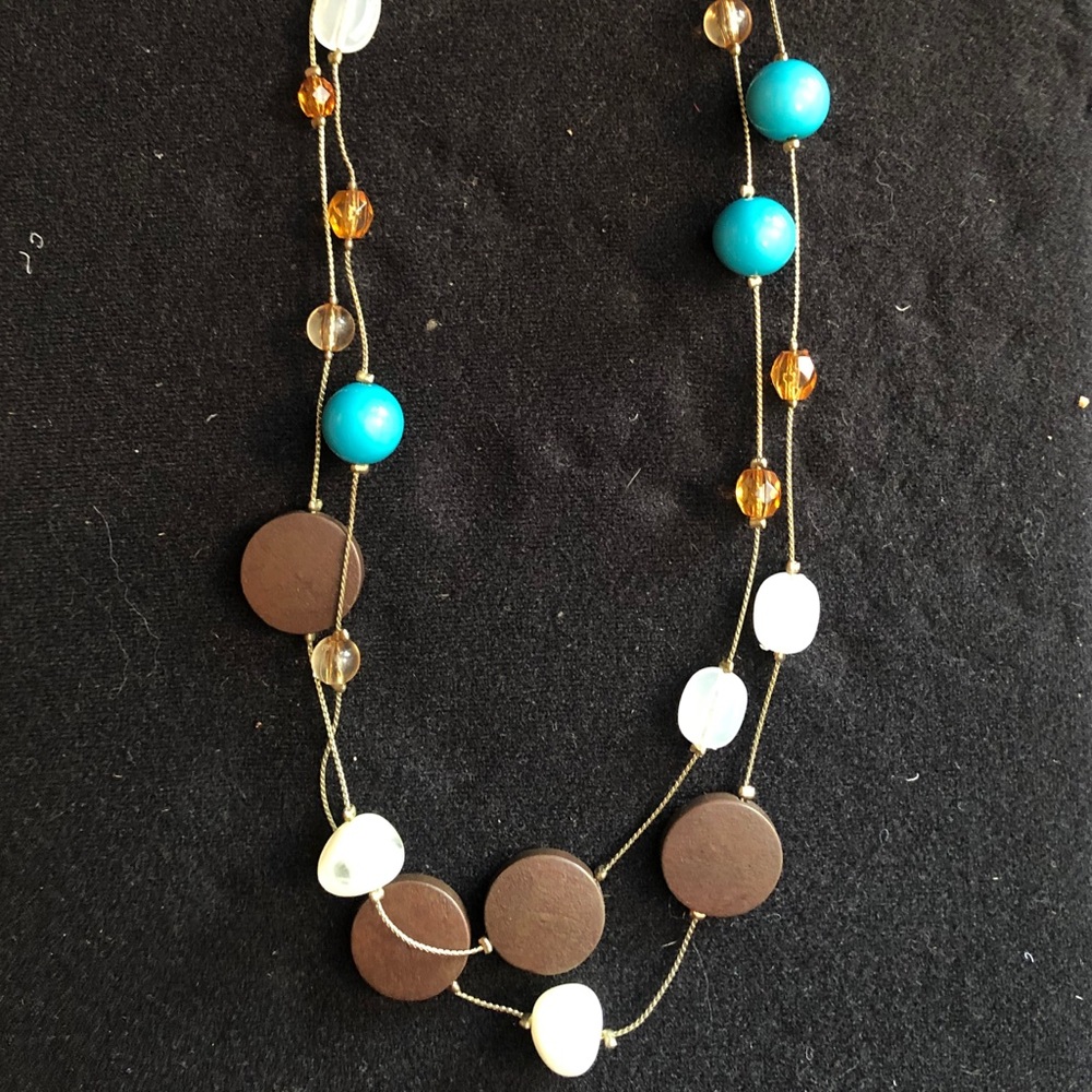Brown and blue beaded necklace and earrings